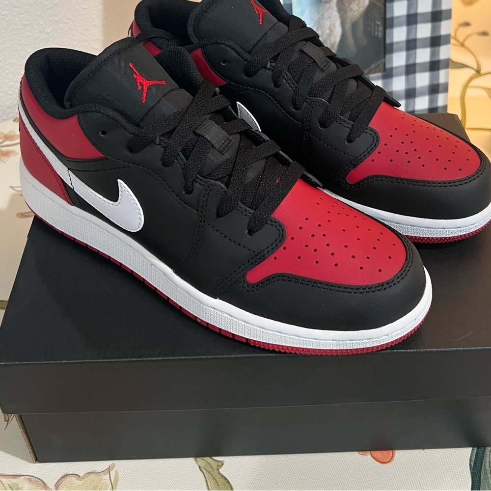 Nike Air Jordan 1 Black and Red Low Tops